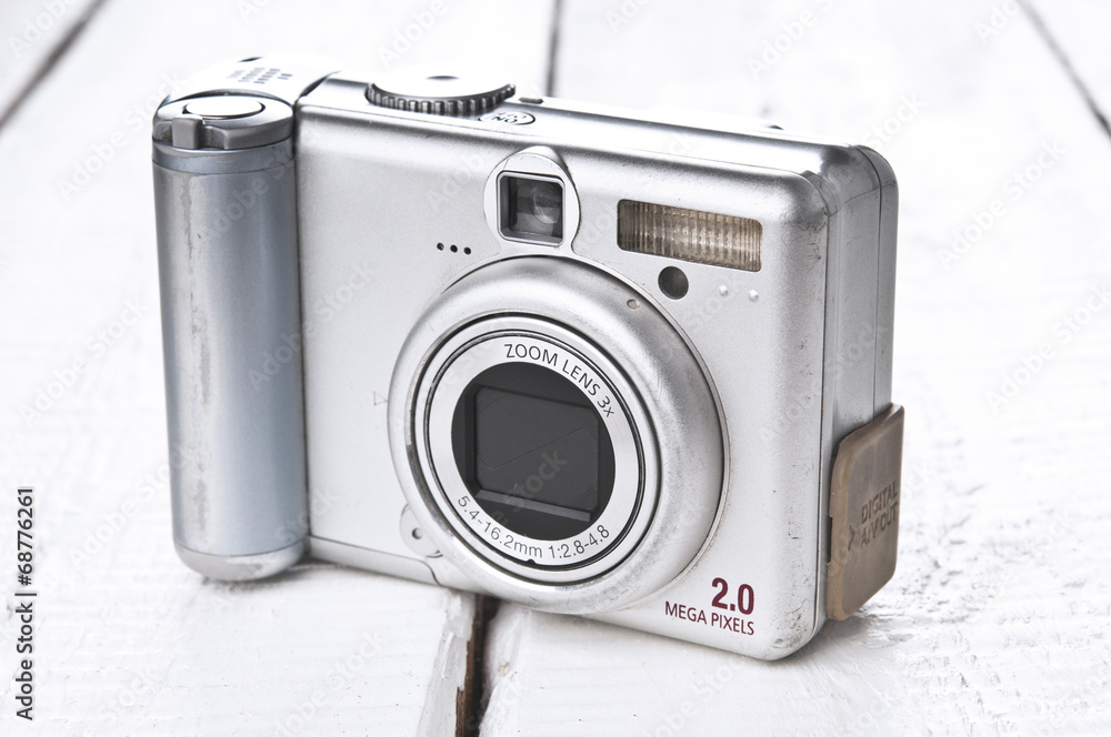 Old grunge compact photo camera