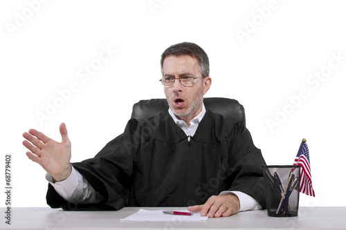 Fotografie middle aged caucasian american judge in a robe sitting