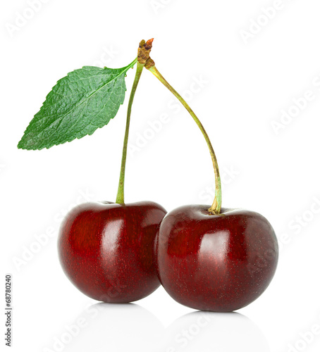 sweet cherry with leaf isolated on white background