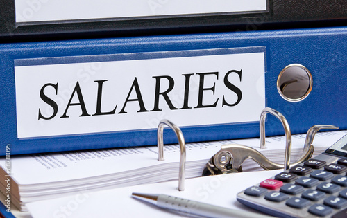 Salaries - blue binder in the office