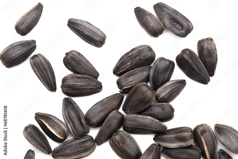 black seeds on a white background black seeds on a white background