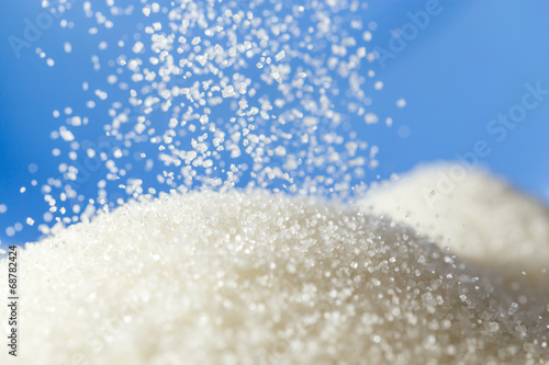 sugar on a blue background photo