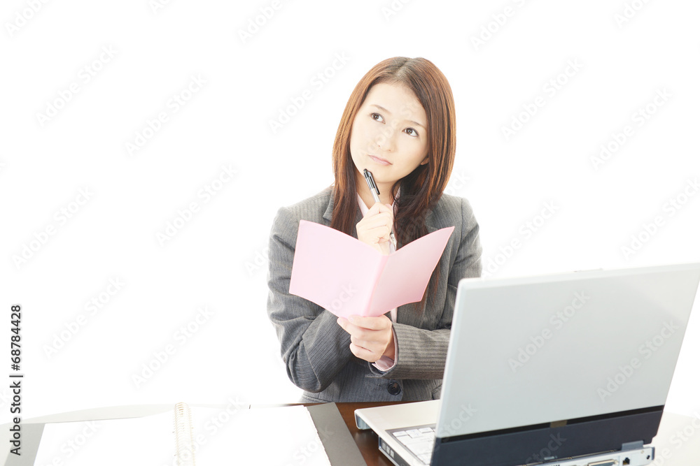 困惑した表情のOL 困惑した表情のOL