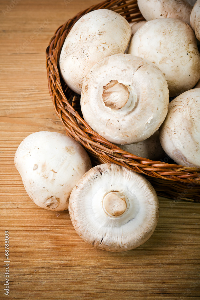 Fresh mushrooms on a wooden board