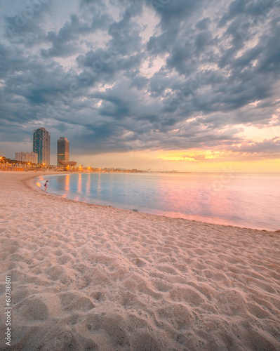 Photography Barceloneta Beach in Barcelona at sunrise