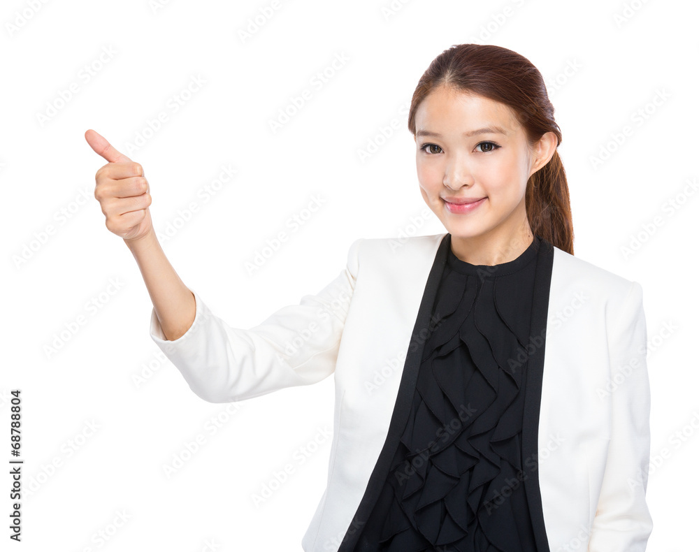 Businesswoman hand with thumb up sign Businesswoman hand with thumb up sign
