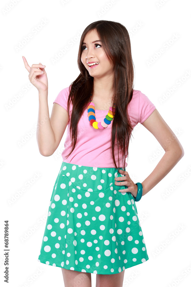 Portrait of a young girl showing blank area Portrait of a young girl showing blank area