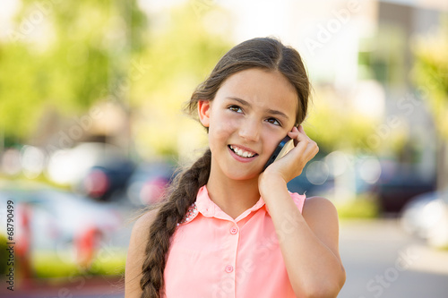 Happy girl talking on mobile, smart phone outside outdoors