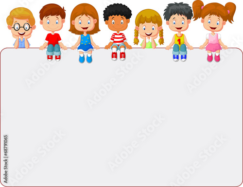 Happy smiling group of kids showing blank placard board