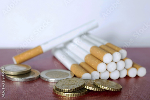 europe currency with cigarettes in background