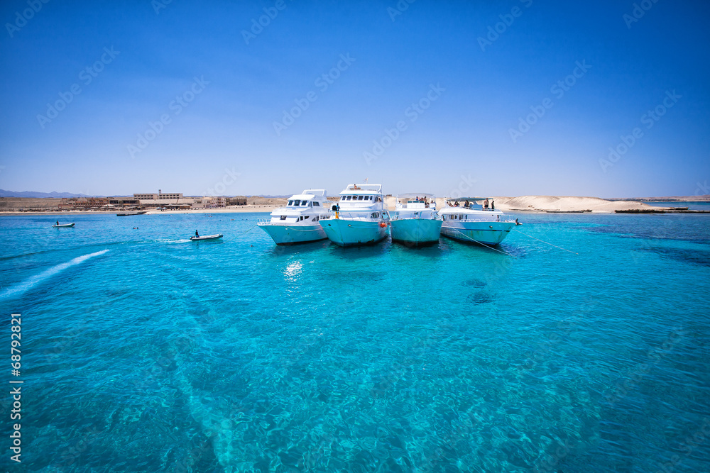 speed boats in tropical sea