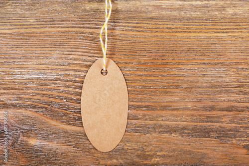 empty tag on brown wooden background
