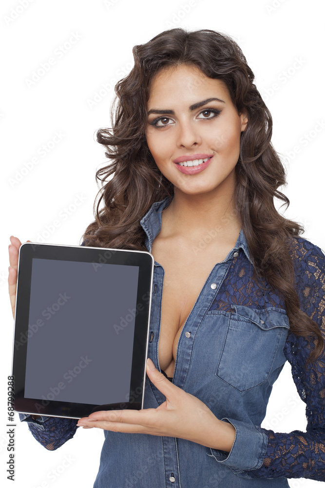 A young and happy girl holding a tablet computer A young and happy girl holding a tablet computer