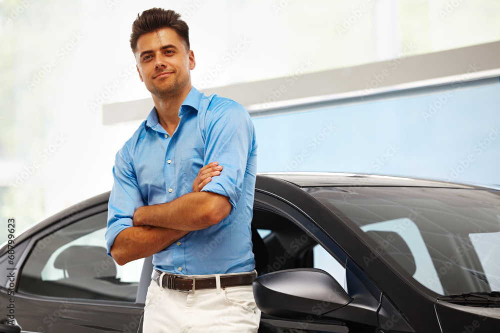 Car Showroom. Happy Man near Car of His Dream. Car Showroom. Happy Man near Car of His Dream.