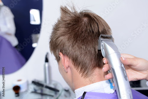 Young man in beauty salon