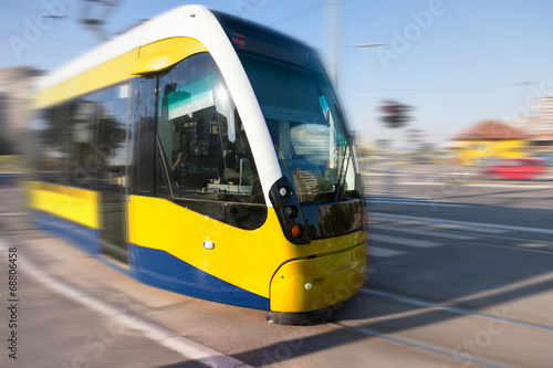 Tram in motion blur on the street
