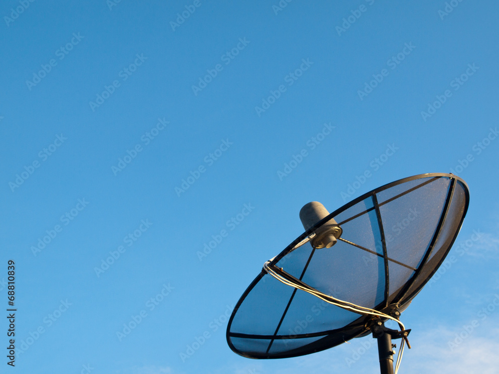 satellite dish in blue sky background