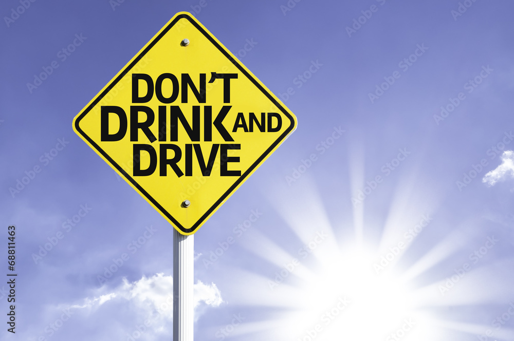 Don't Drink and Drive road sign with sun background Don't Drink and Drive road sign with sun background