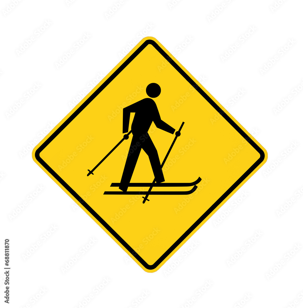 road sign - yellow - cross-country skier in black road sign - yellow - cross-country skier in black