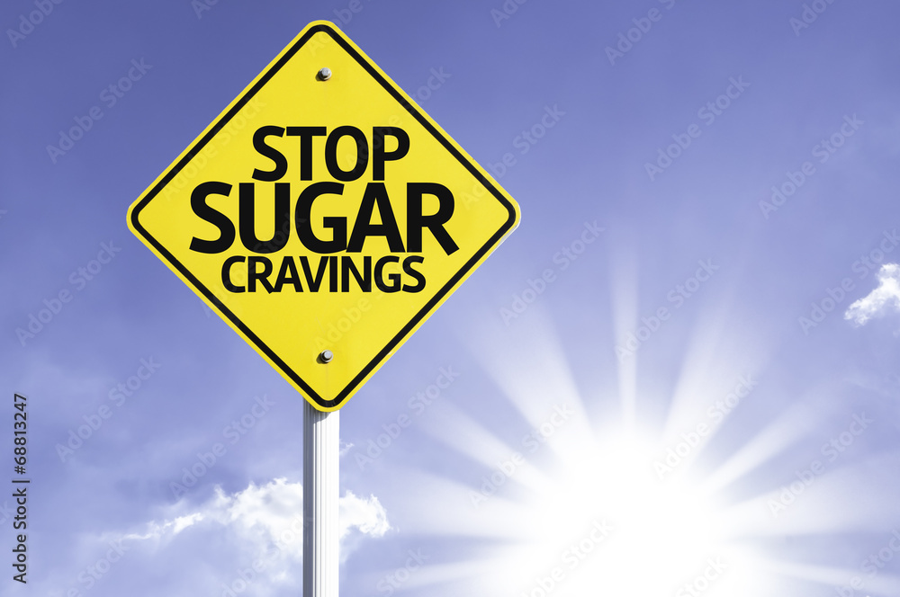 Stop Sugar Cravings road sign with sun background Stop Sugar Cravings road sign with sun background