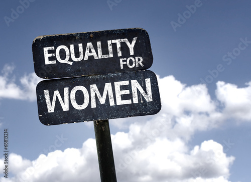 Equality for Women sign with clouds and sky background photo