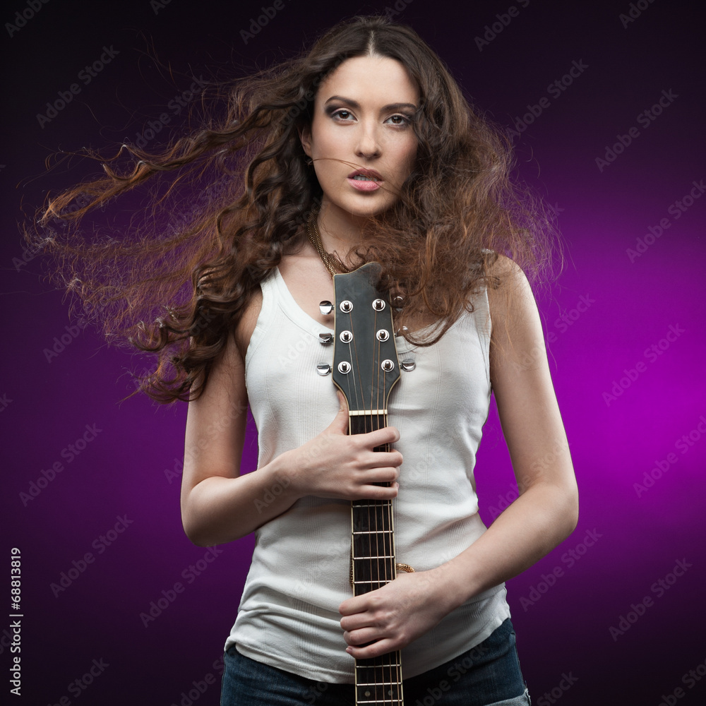 sexy girl holding guitar