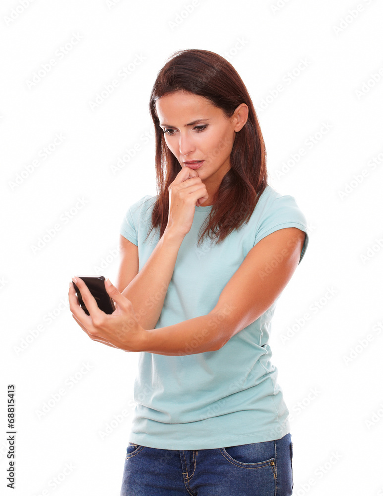 Beautiful woman looking on her cellphone Beautiful woman looking on her cellphone