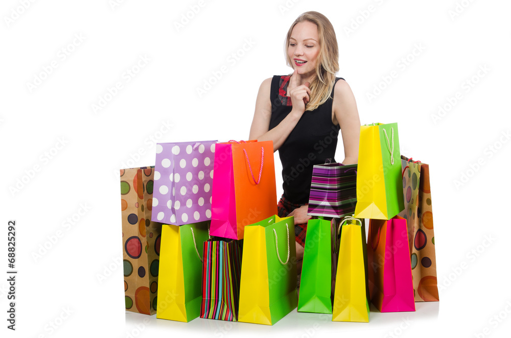 Young woman after shopping isolated on the white Young woman after shopping isolated on the white