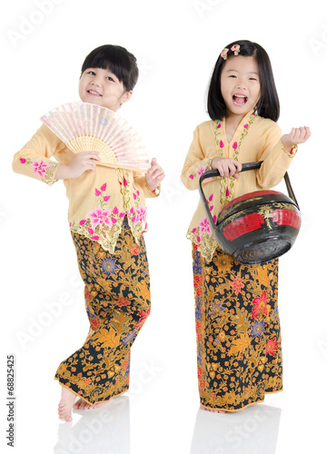 little girls in nyoya traditional costume