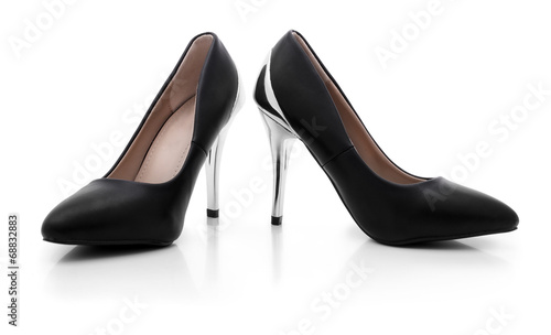 Sexy black shoes with silver high heels on white background