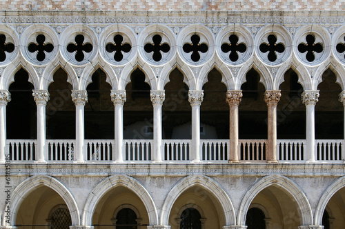 Venetian Gothic architecture: fragment of venetian window, rhyth photo