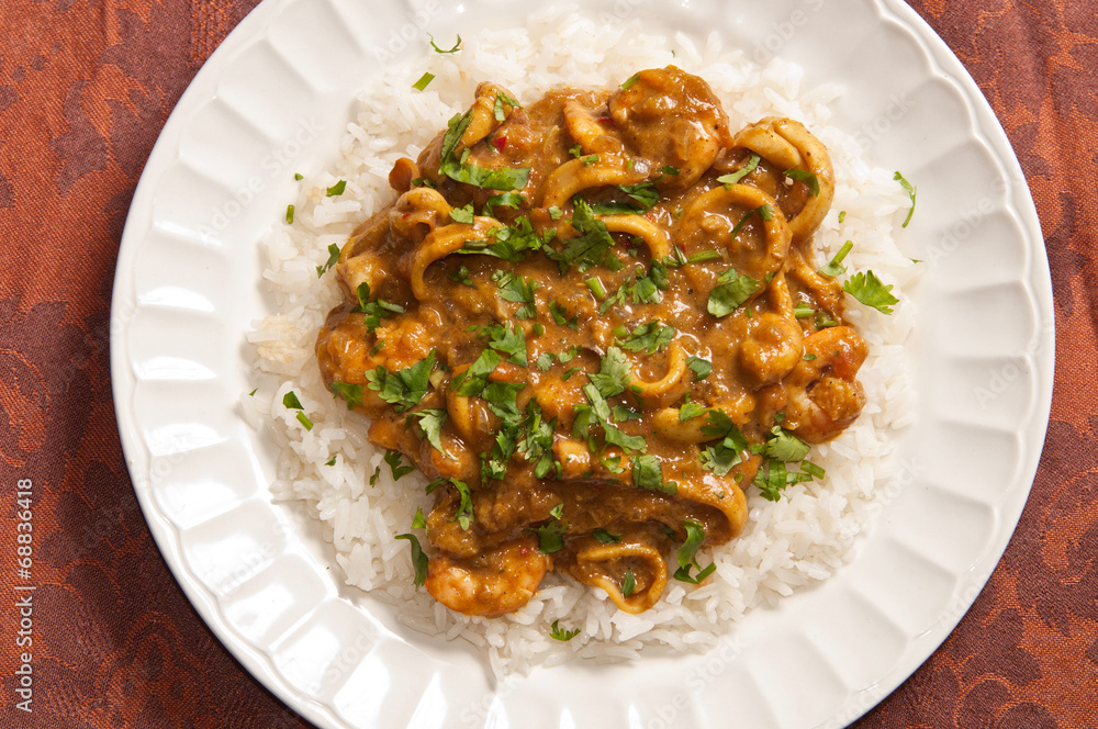 Delicious sea food curry with mango, coconut milk and white rice as side (zenith photo) Delicious sea food curry with mango, coconut milk and white rice as side (zenith photo)