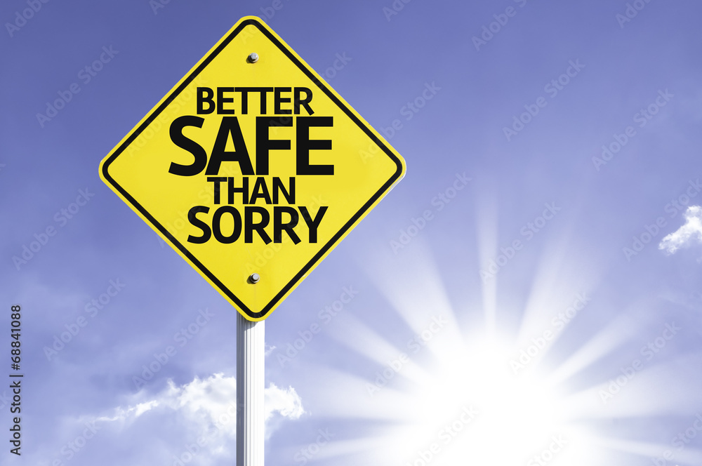 Better Safe Than Sorry road sign with sun background Better Safe Than Sorry road sign with sun background