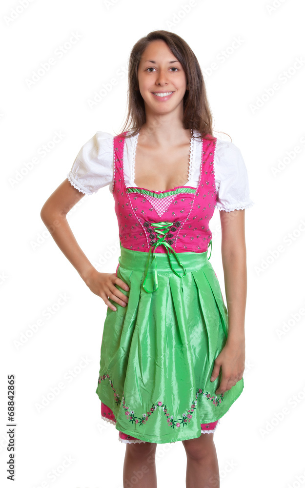 Stehende junge Frau im Dirndl Stehende junge Frau im Dirndl