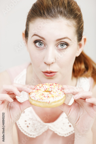 Woman eating a doughnut