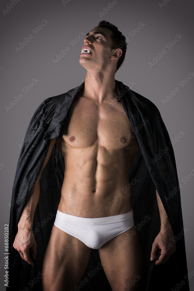 Naked man in briefs posing as a vampire Naked man in briefs posing as a vampire