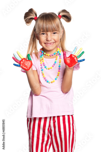 Little girl with paints on hands