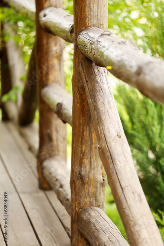 Old wooden fence in the garden