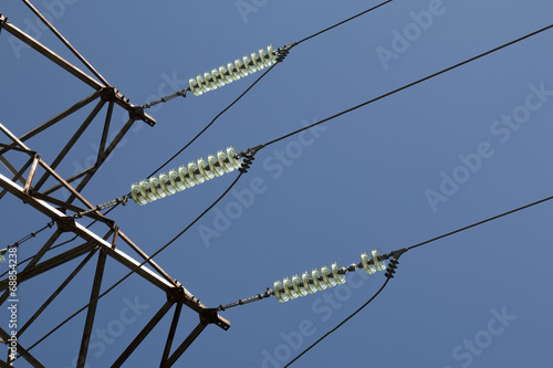 Insulators of high-voltage power lines photo