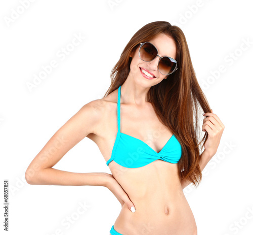 Beautiful young woman in swimsuit isolated on white