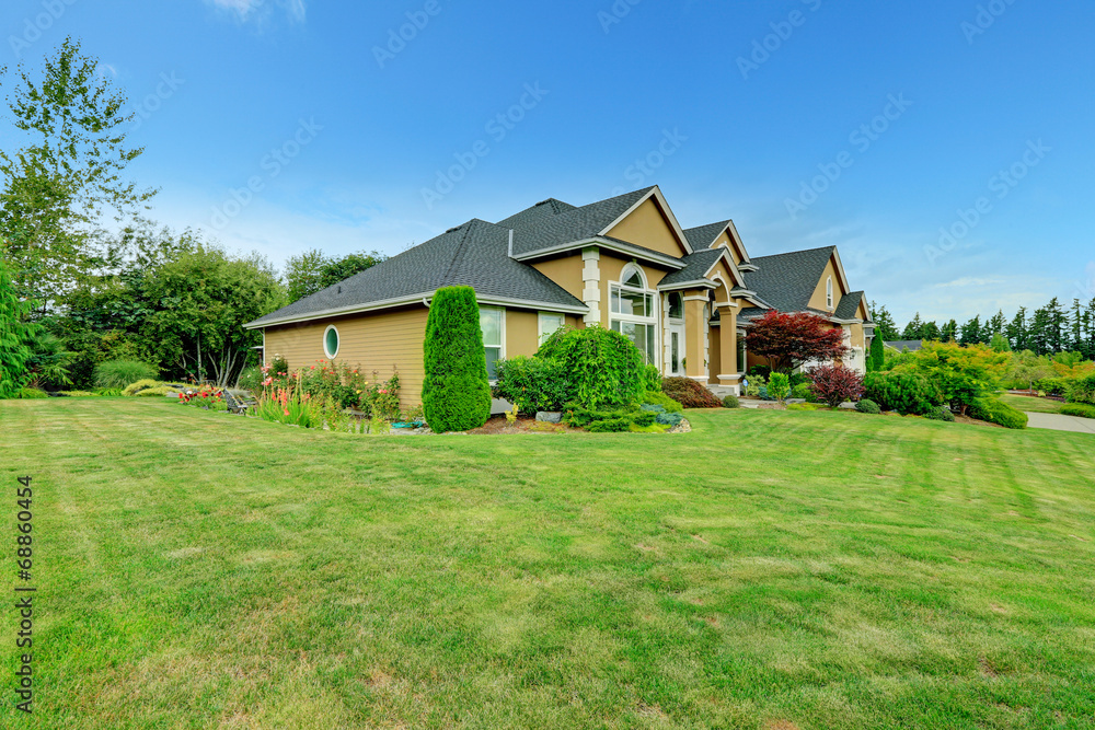 House exterior with landscape