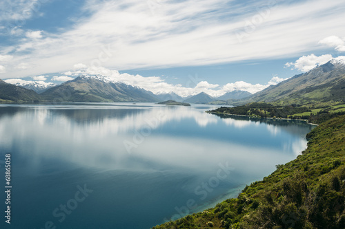 Reflection of the mountain range on Lake Wakatipu, New Zealand © mohdnadlyaizat