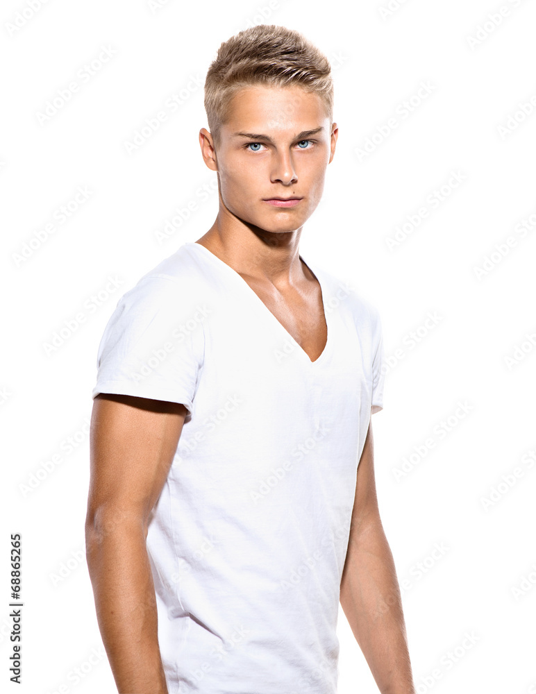Handsome young man in white t-shirt isolated on a white Handsome young man in white t-shirt isolated on a white