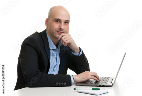 Busy businessman working on his laptop