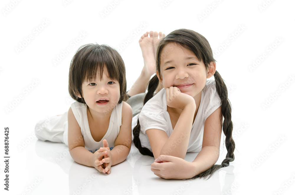 Smiling brother and sister Isolated Smiling brother and sister Isolated