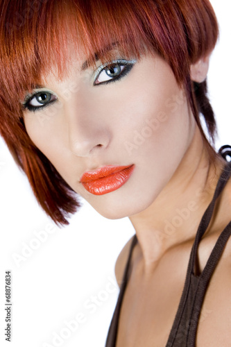 Portrait of a beautiful red-haired girl 