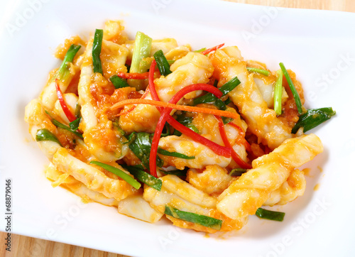 Stir fried squid with salted egg yolk