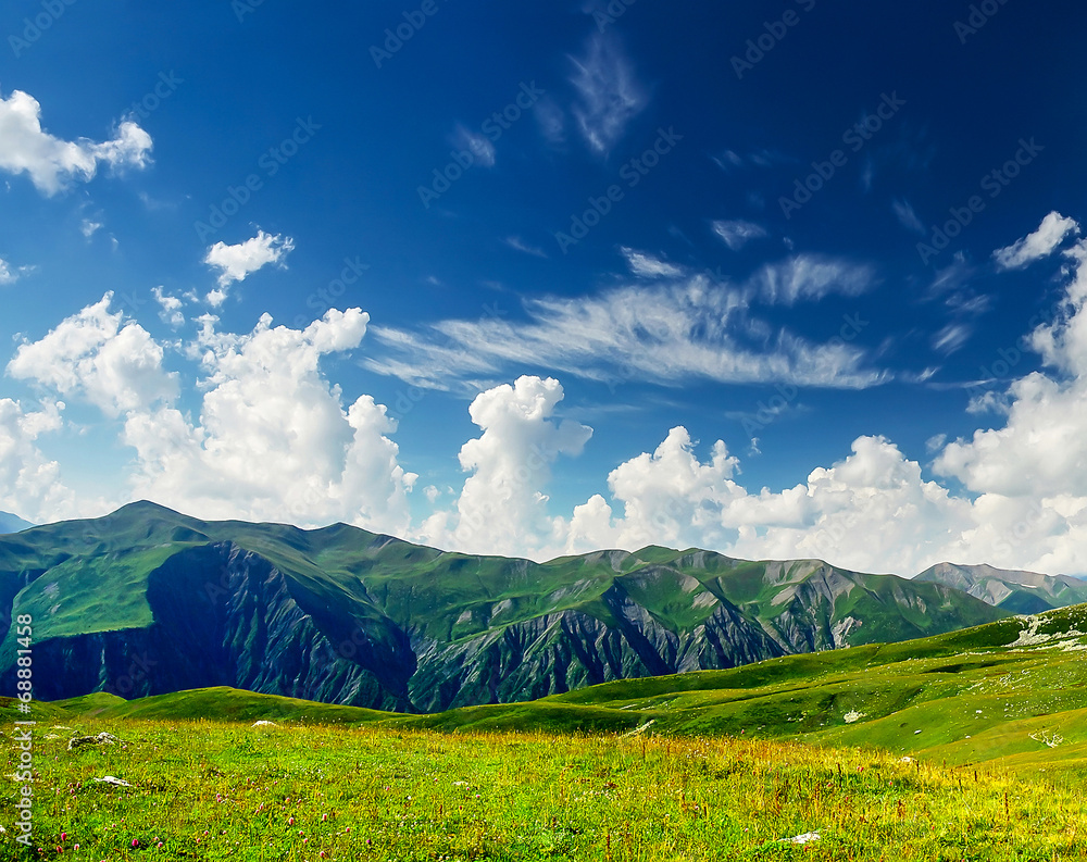 High mountains and clouds. Natural landscape