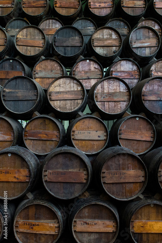 Wine barrels stacked in the cellar of the Quinta da Bacalhoa 