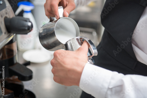 Barista doing your coffee